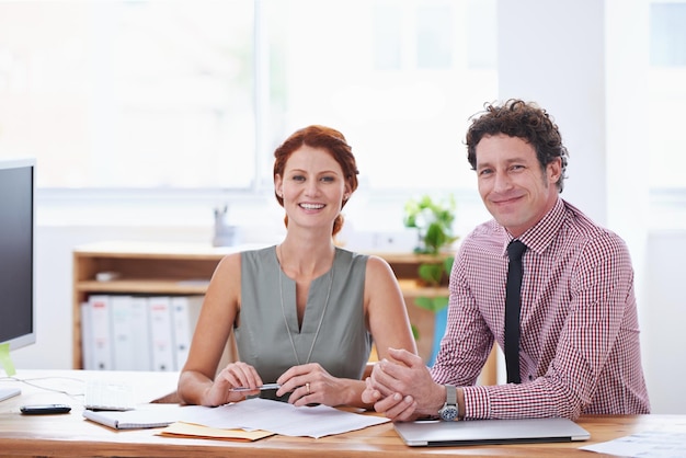 business people teamwork planning office desk support collaboration with financial documents professional accountant advisor man woman with paperwork face happy portrait 590464 320153